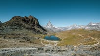 Reflection of the Matterhorn in Riffelsee Lake on the Gornergrat in summer 