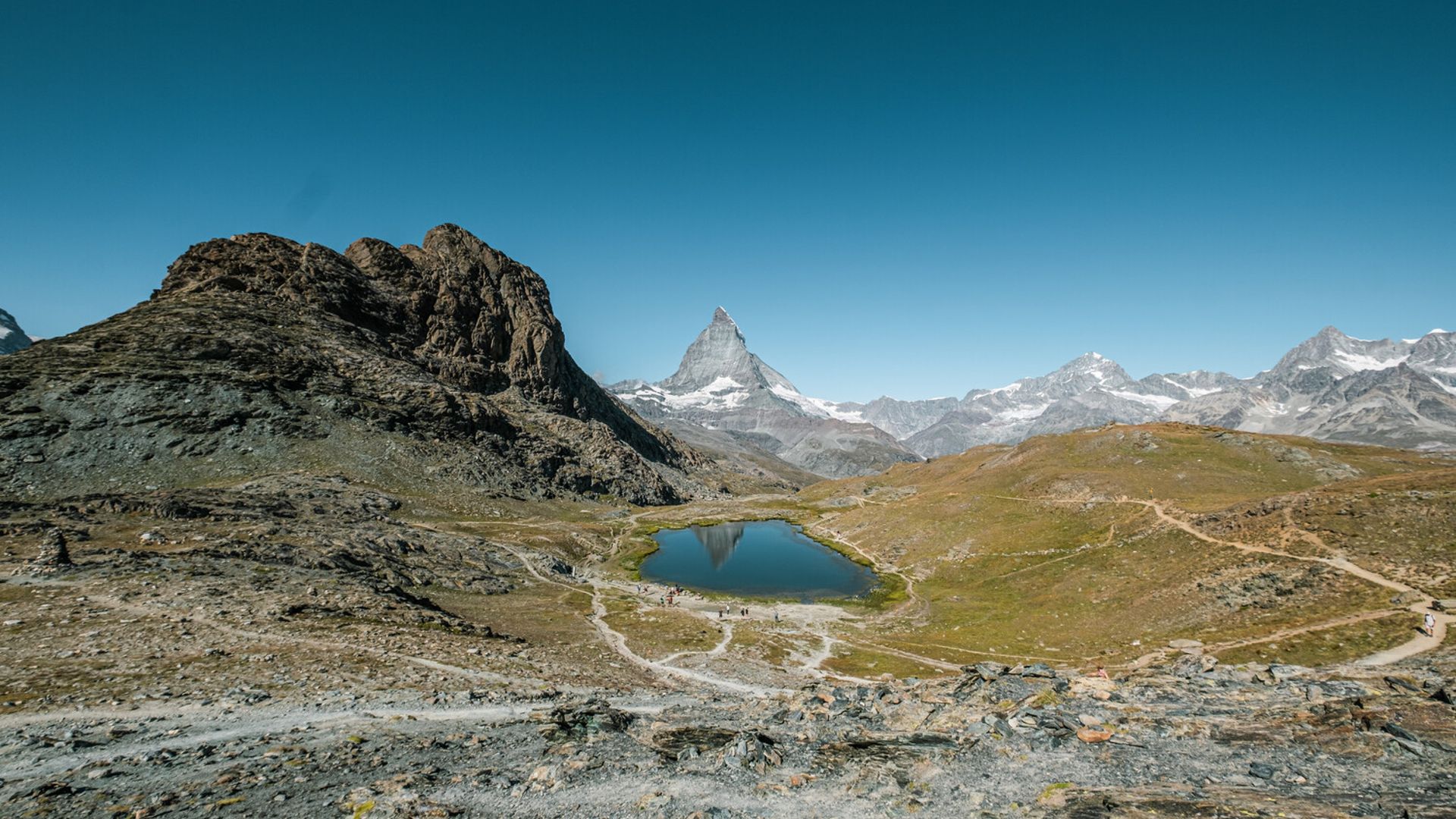 Reflection of the Matterhorn in Riffelsee Lake on the Gornergrat in summer