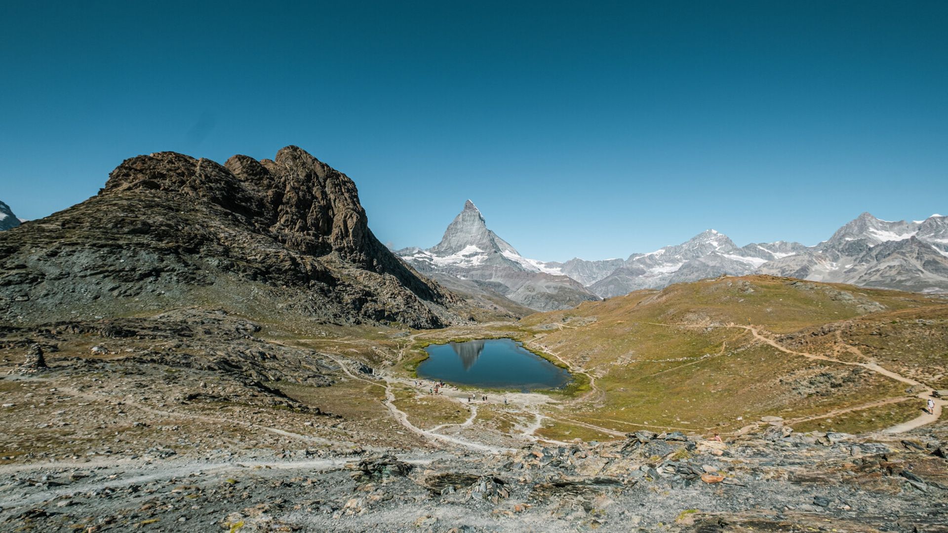Reflection of the Matterhorn in Riffelsee Lake on the Gornergrat in summer 