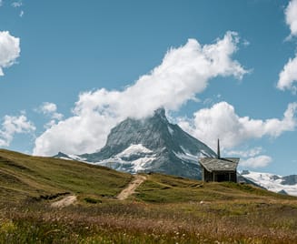 Hiking trail to the Riffelberg chapel with the Matterhorn in the background 